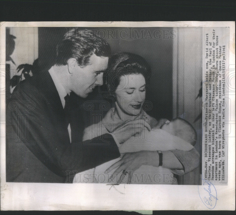 1961 Princess Margaret holds son, David Alebrt Charles, Viscount - Historic Images