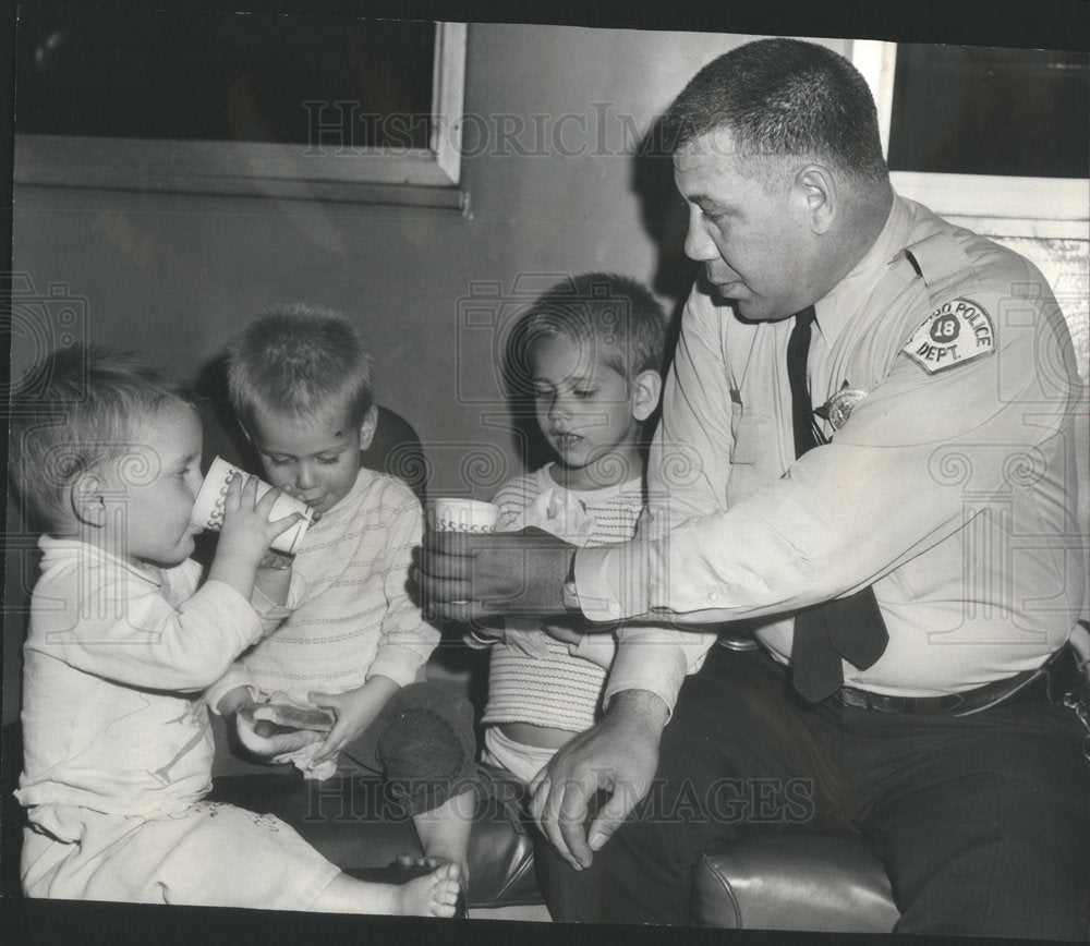 1966 Officer Joseph Leon Feeds Three Abandoned Children-Historic Images