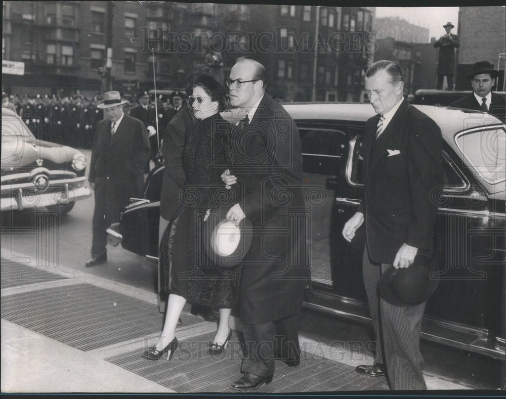 1950 Mrs. Kelly aand Joseph, an adopted son, got ot the funeral Mass-Historic Images