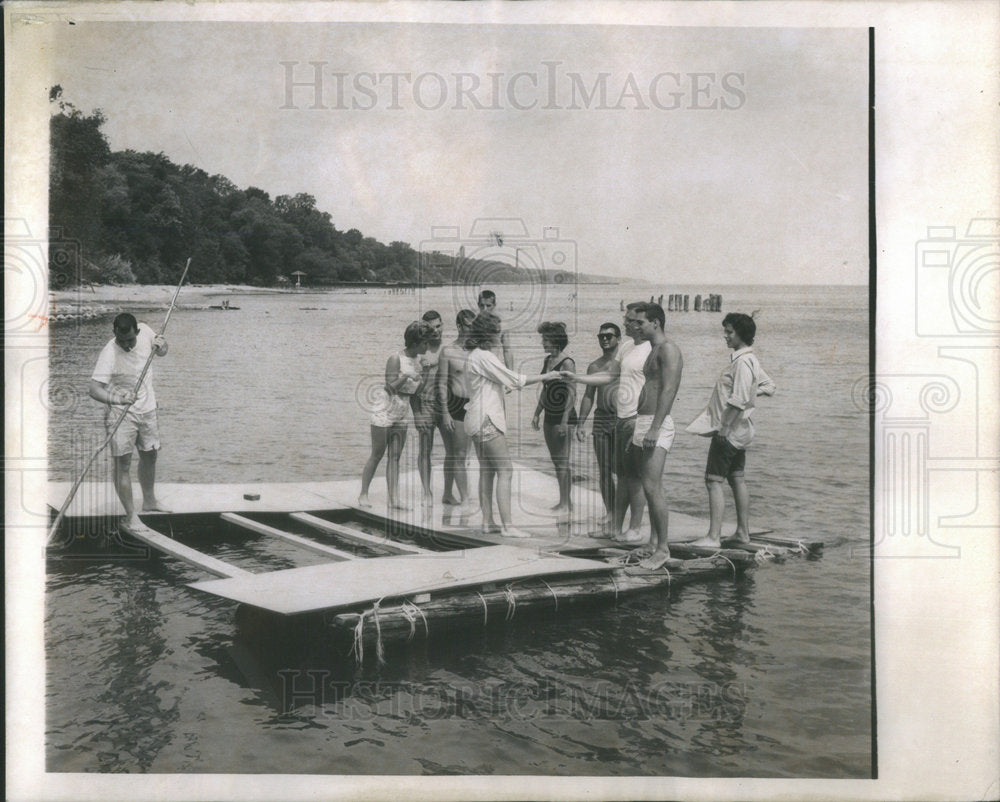 1961 Linda cavorts with friends.-Historic Images