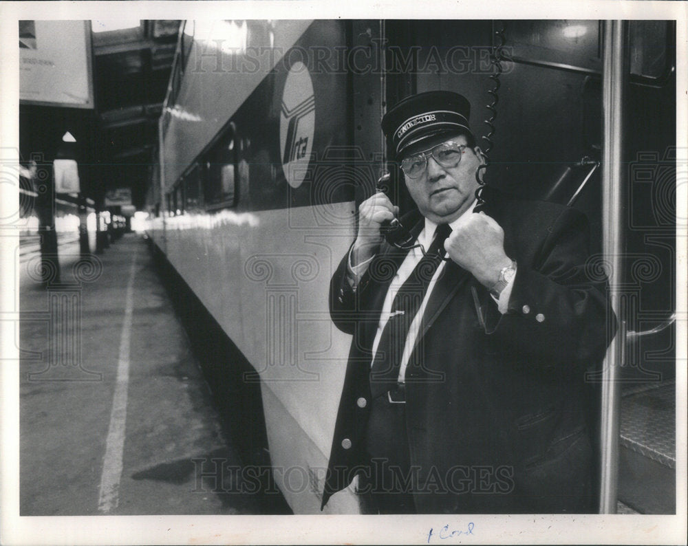 1988 Conductor Richard Jenner Poses At Northwestern Station-Historic Images