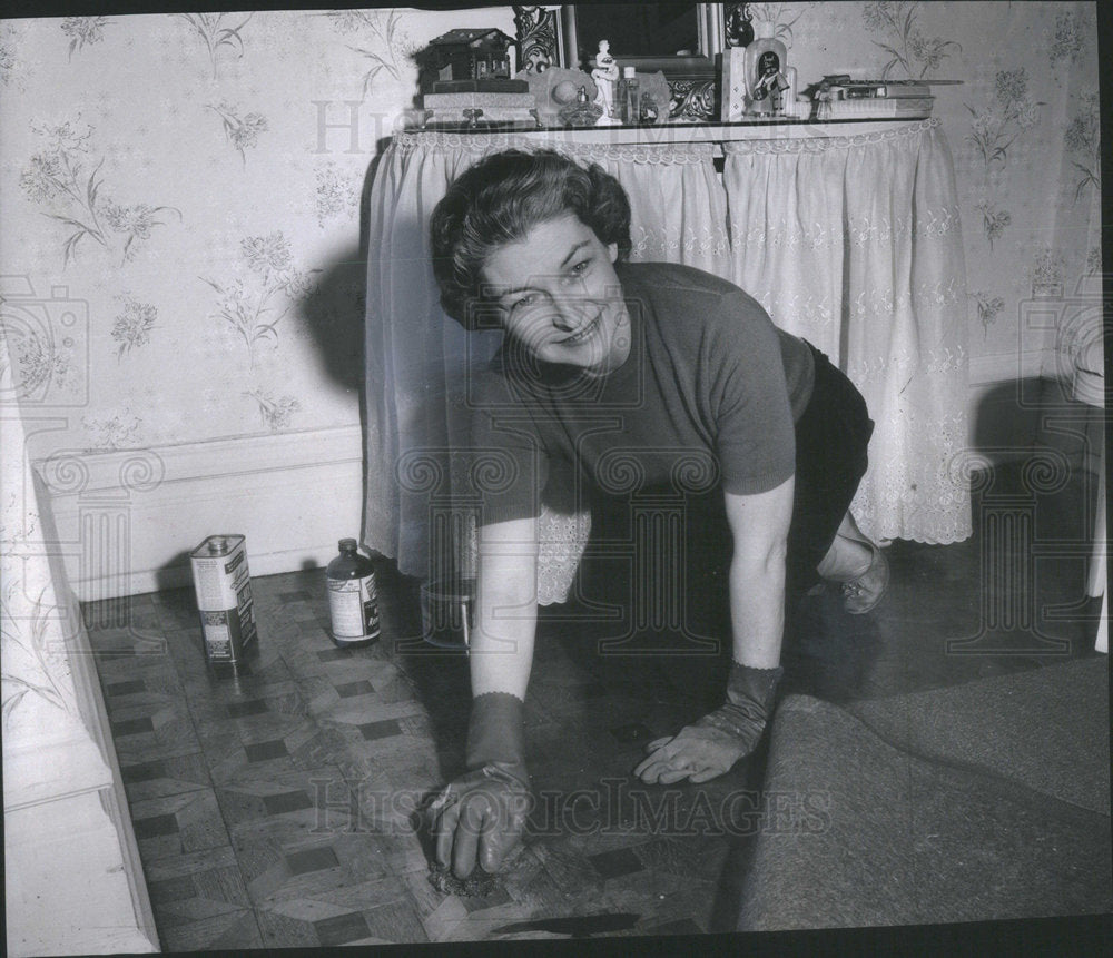 1961 Mrs. John Kenward renewing parquet floor to original glow-Historic Images