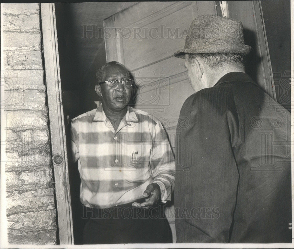 1966 Pope Watkins Opens the Door for Irwin Howe at the Slum - Historic Images