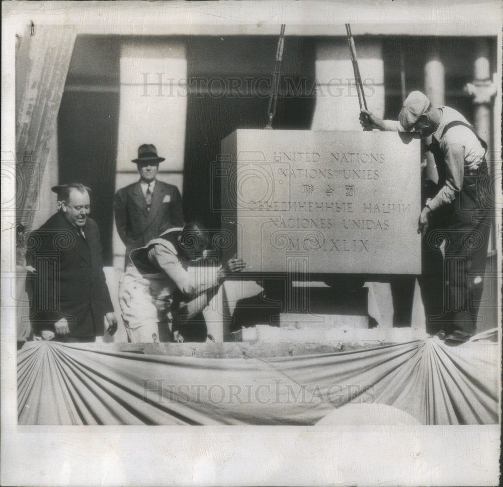 1949 Trygve Lie Stands by as the Cornerstone for U.N. Headquarters - Historic Images