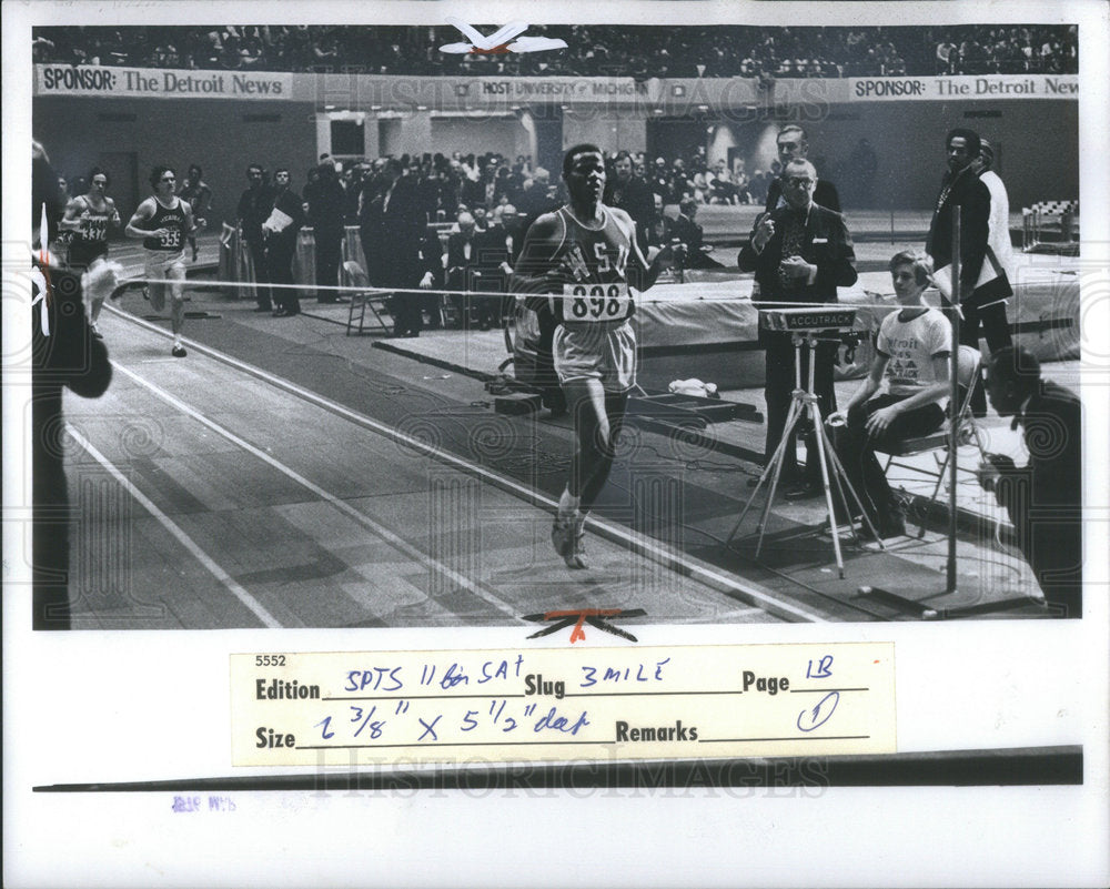 1976 3 mile winner crossing finish line at NCAA Track Meet - Historic Images