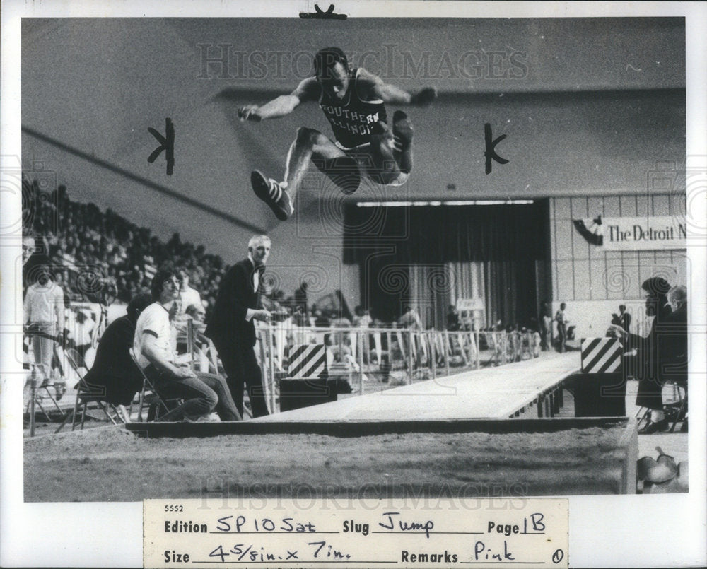 1977 NCAA Indoor Track Long Jumper Rock - Historic Images