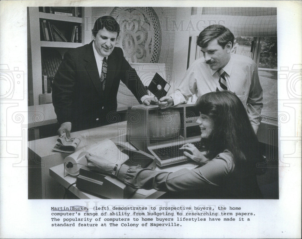 Press Photo Martin Burke Demonstrates to Prospective Buyers - Historic Images