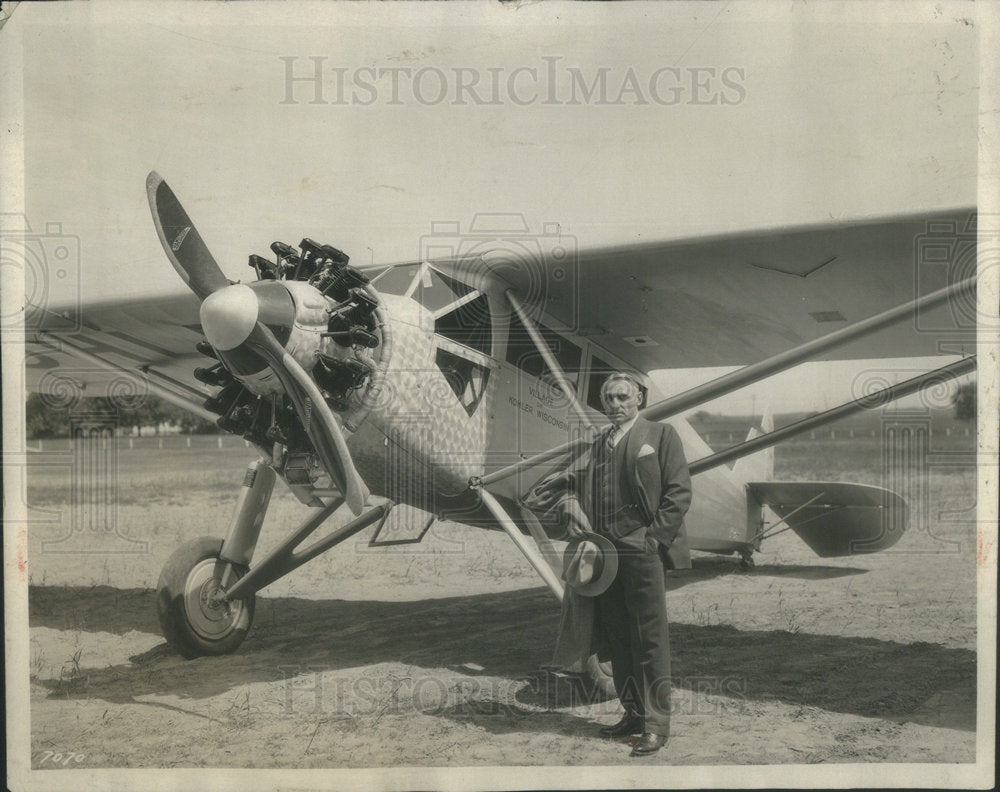 1930 Gov. Walter J. Kohler and his plane - Historic Images