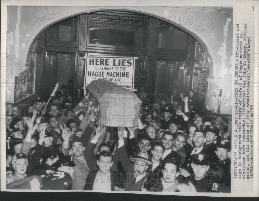 1949 Press Photo Casket and sign in background tell story of defeet of Hague - Historic Images