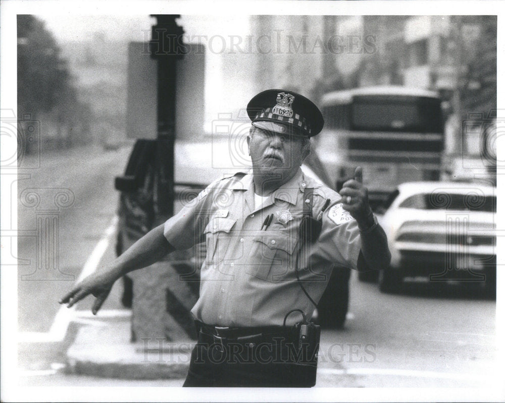 1990 Press Photo TRAFFIC COP BILL "CECIL" PAVICHEVICH MICHIGAN BALBO - RSC35951 - Historic Images