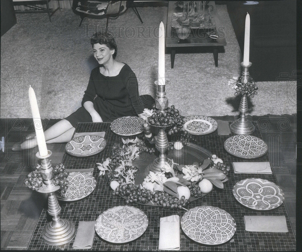 1960 Mrs. Albert H. Newman sits by blue ceramic tile table - Historic Images