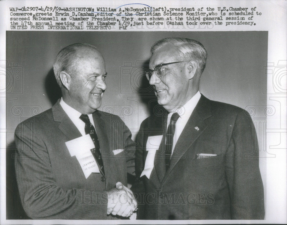 1959Press Photo William McDonell Pres.of Chamber of Commerce greets Erwin Canhan - Historic Images