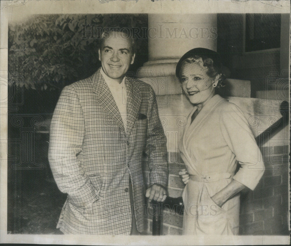 1952 Pickford and husband Buddy Rogers, pause of step.  - Historic Images