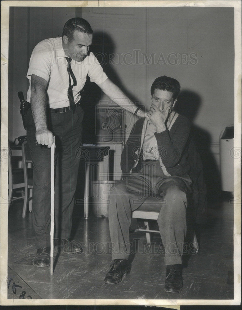 1963 A "blind" beggar who tried to play it, Salvatore Palumbo arrest - Historic Images