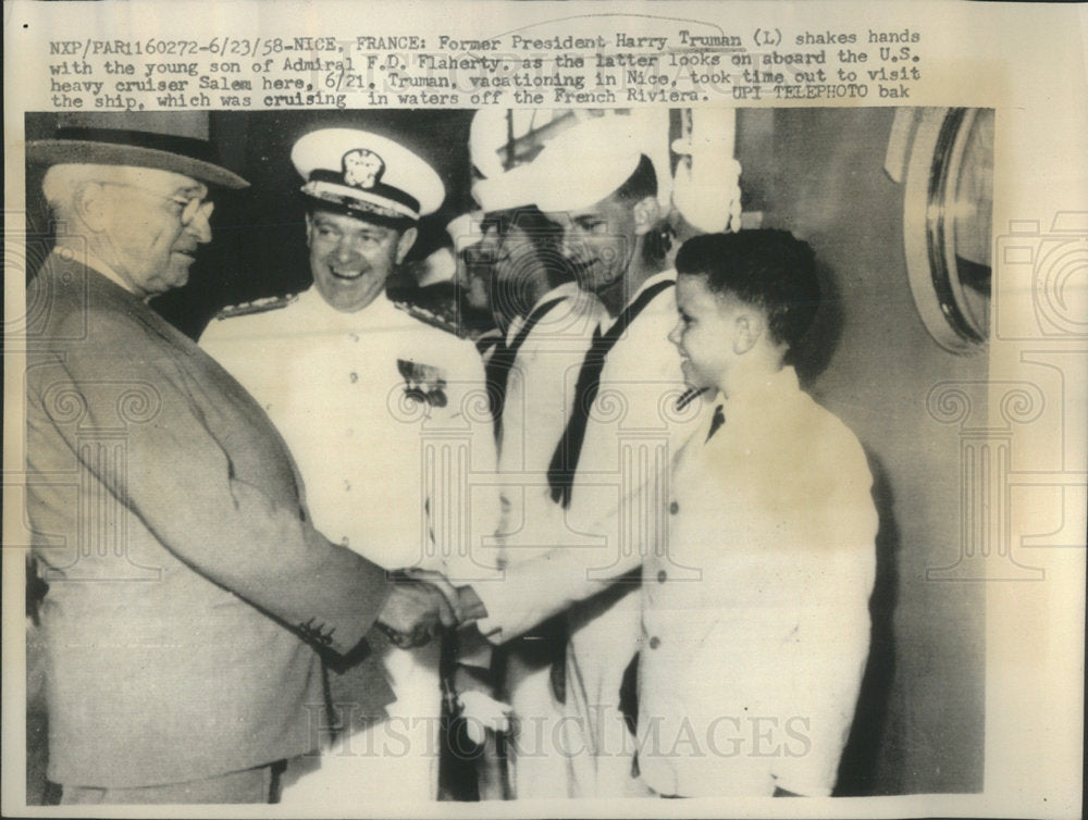 1958 Former President Harry Truman shakes hands son Admiral Fiaherty - Historic Images