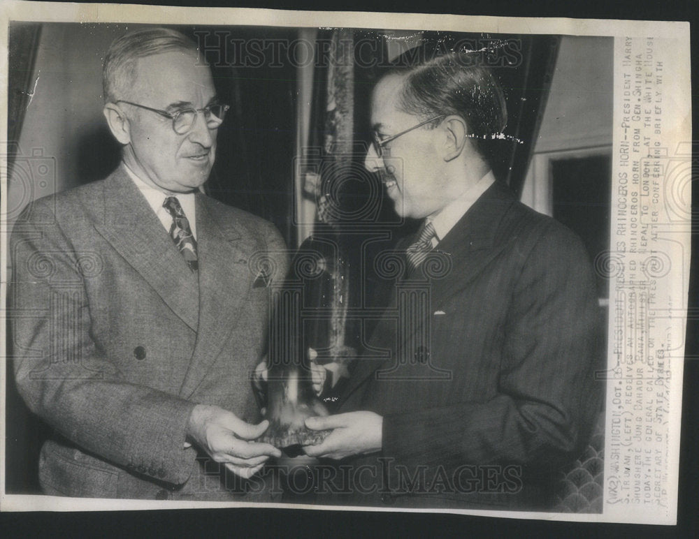 1959 Pres Truman gets a Rhino horn from Gen Shingha Shuushere - Historic Images