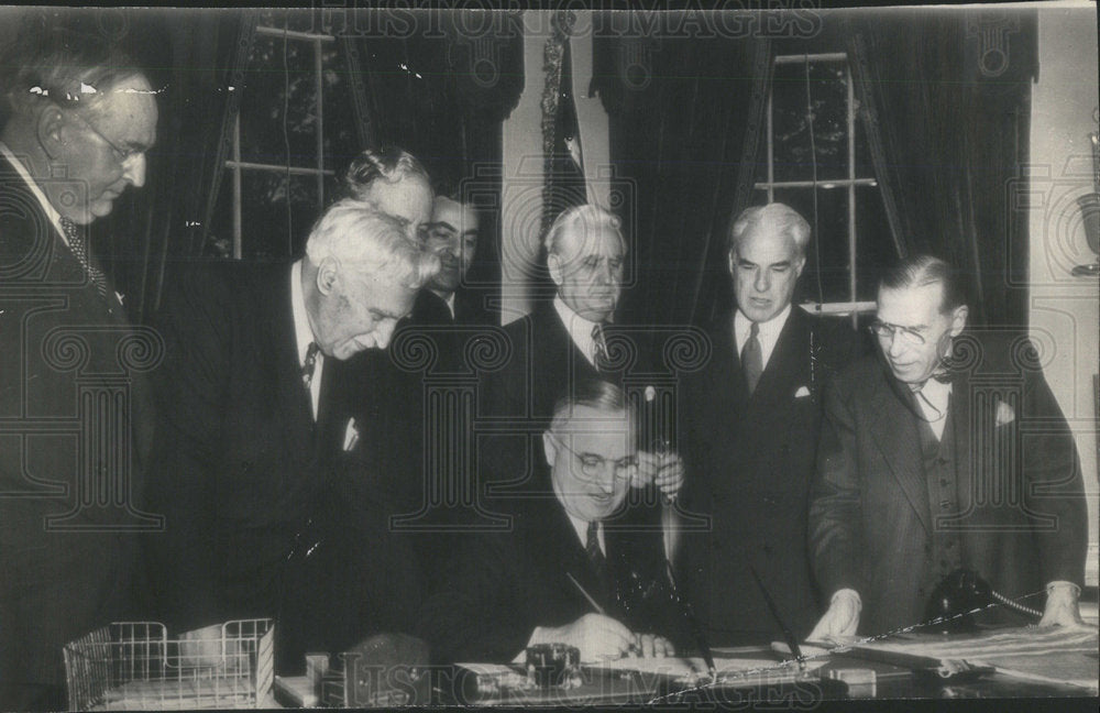 1945 President Harry Truman signs the Lend-Lease Extension Bill - Historic Images