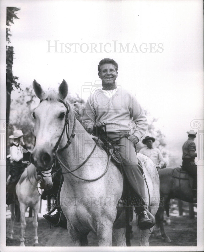 Press Photo Man Smiling Riding Horse - Historic Images