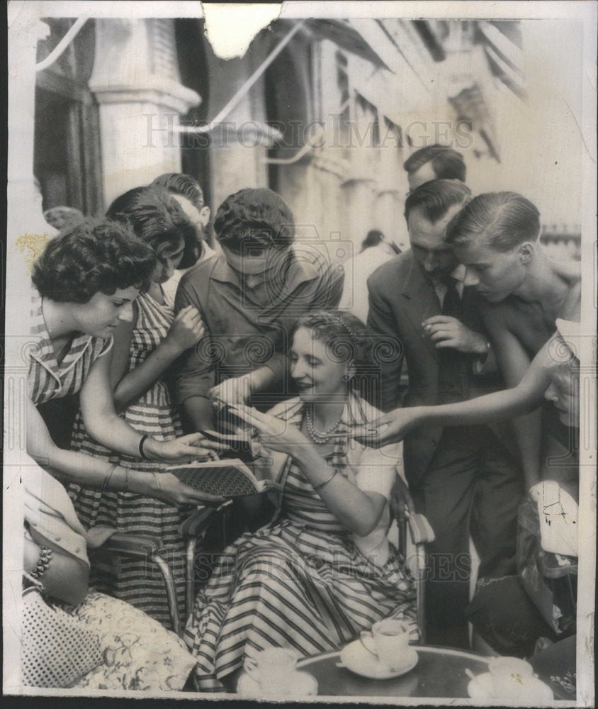 1955 Mrs. Margaret Truman Signing Autographs. - Historic Images