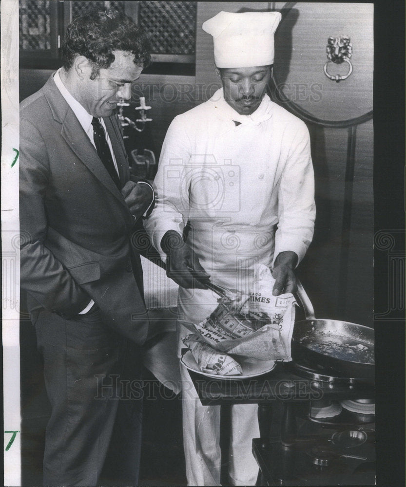 1967 Julio LaRosa Watching Chef Cook Perch At Sage's East In Chicago - Historic Images