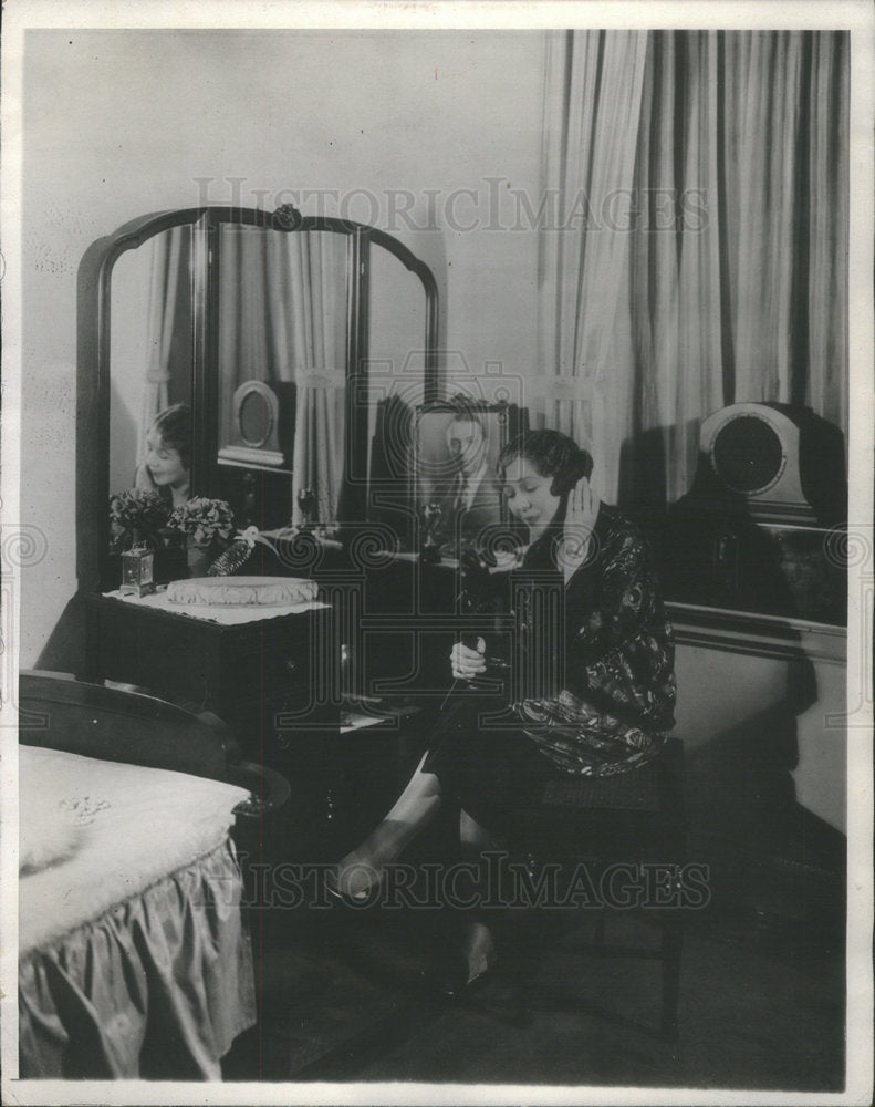 lady in room on phone - Historic Images