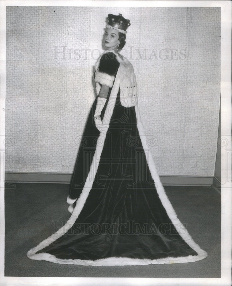 1953 Mitizi Proulx models a coronation robe. - Historic Images