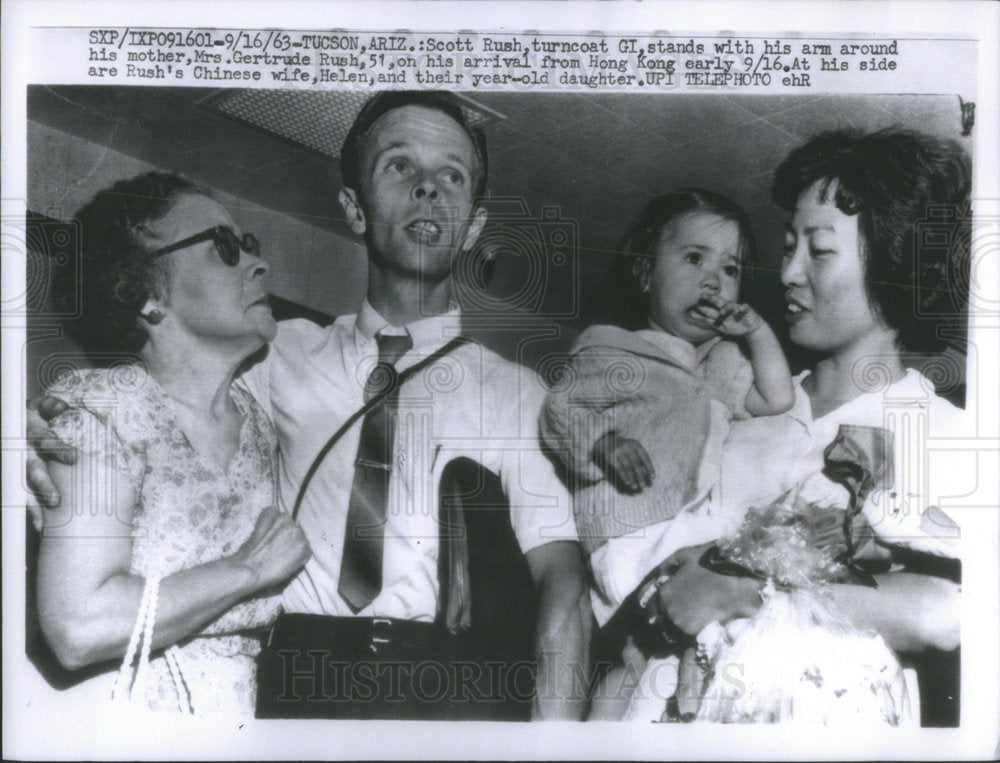 1963 Scott Rush, turncoat GI, stands with his arm around his mother - Historic Images