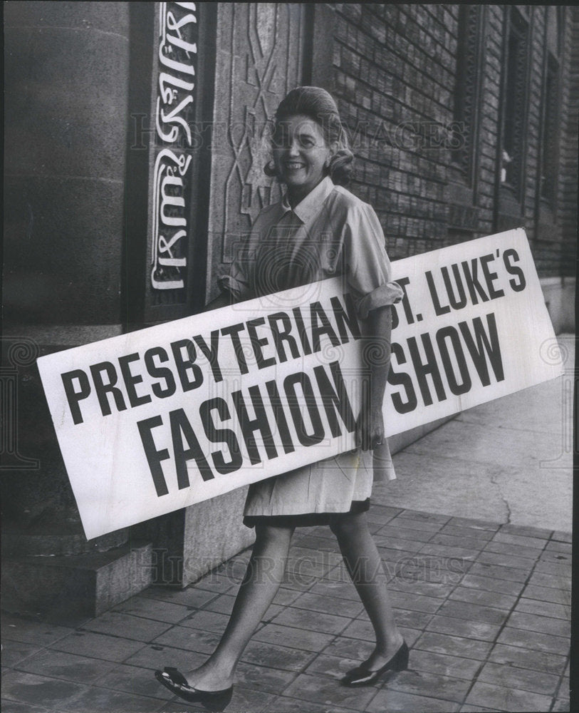 1968 Fashion Show Decorating Committee Chairman Dering Carrying Sign - Historic Images