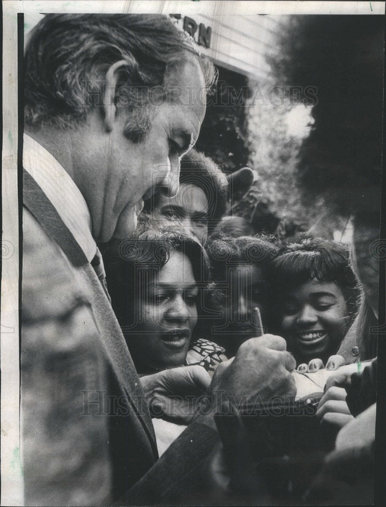 1972 Senator McGovern Signing Autographs Outside Colonial House - Historic Images