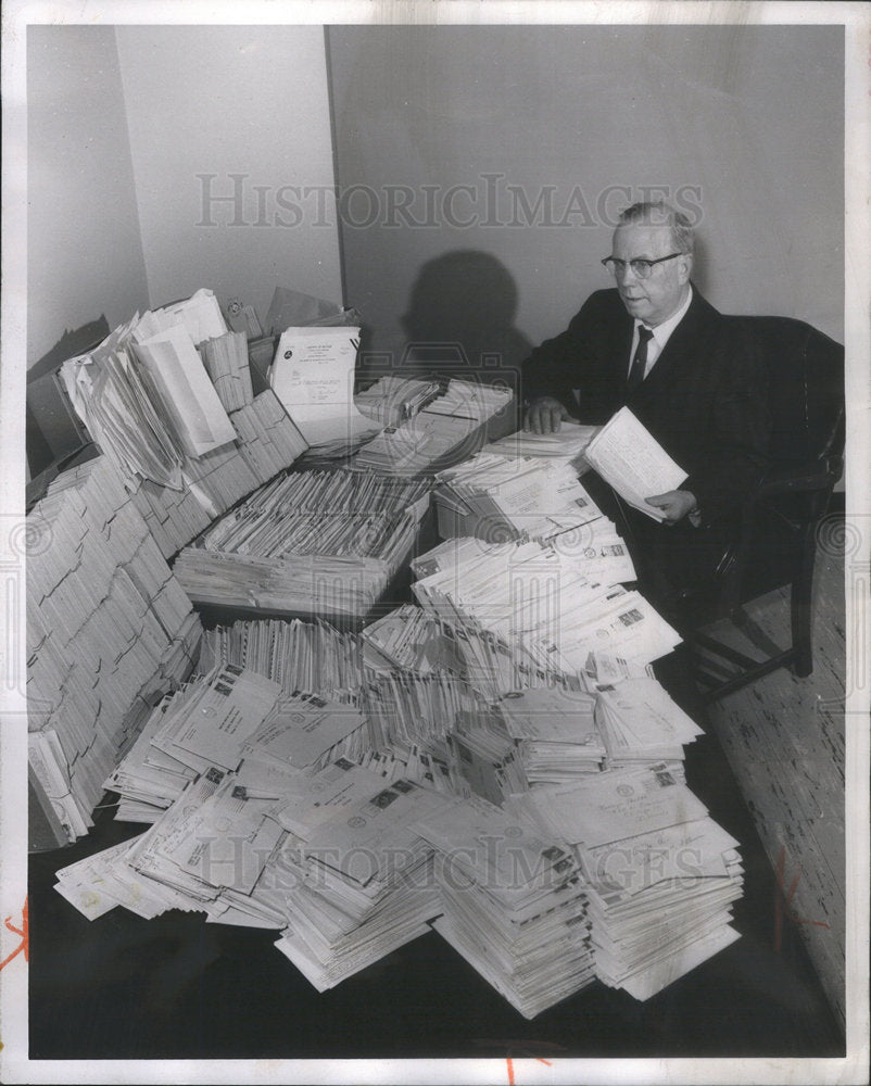 1962 Dr. Leonard Larson with one day mail. - Historic Images