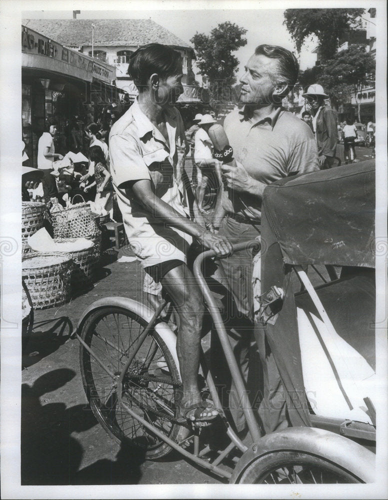 1965 Morgan interviews driver during  The Agony of Vietnan. - Historic Images