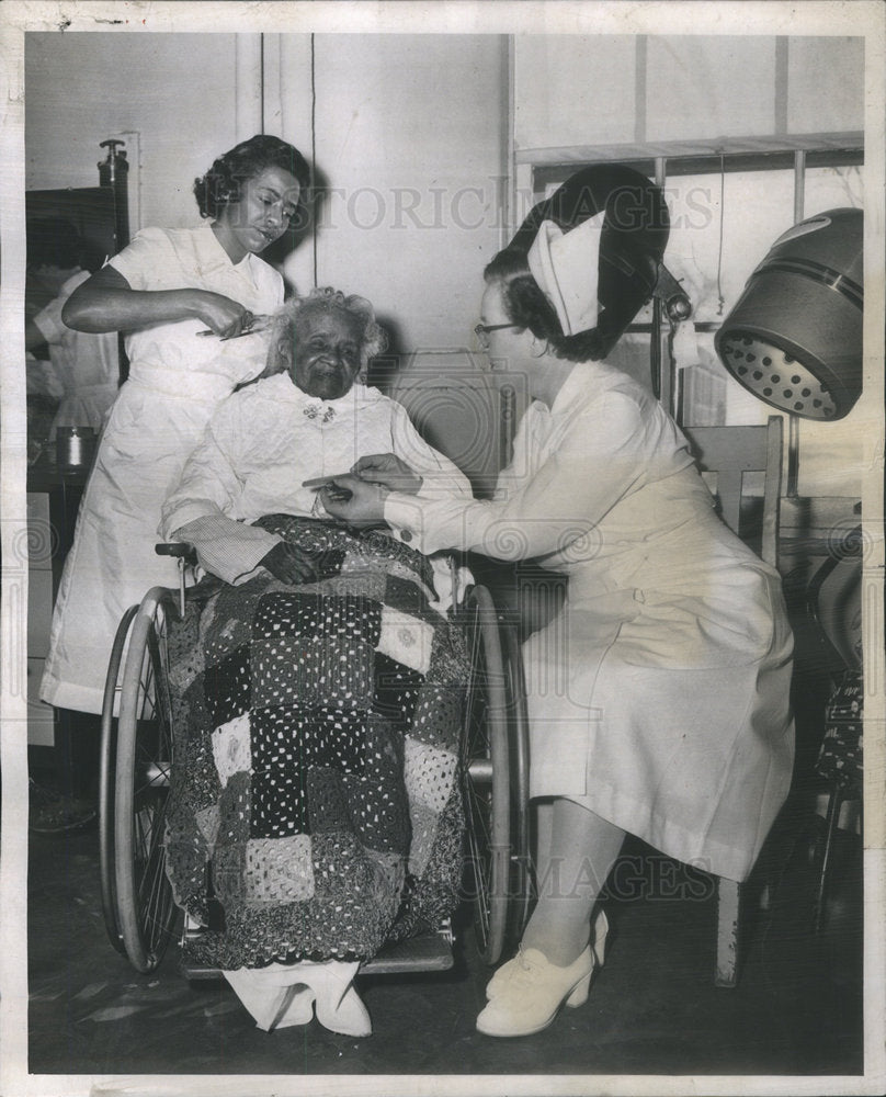 1958 Sally Powel hospital beautician for Oak Forrest with Mrs. Teres - Historic Images