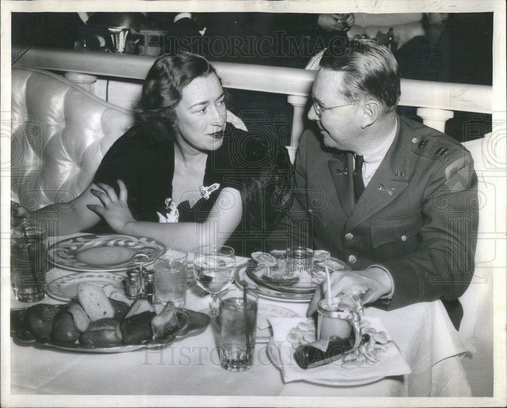 1942 Captain and Mrs. Gaylord Olmsted at a dinner - Historic Images