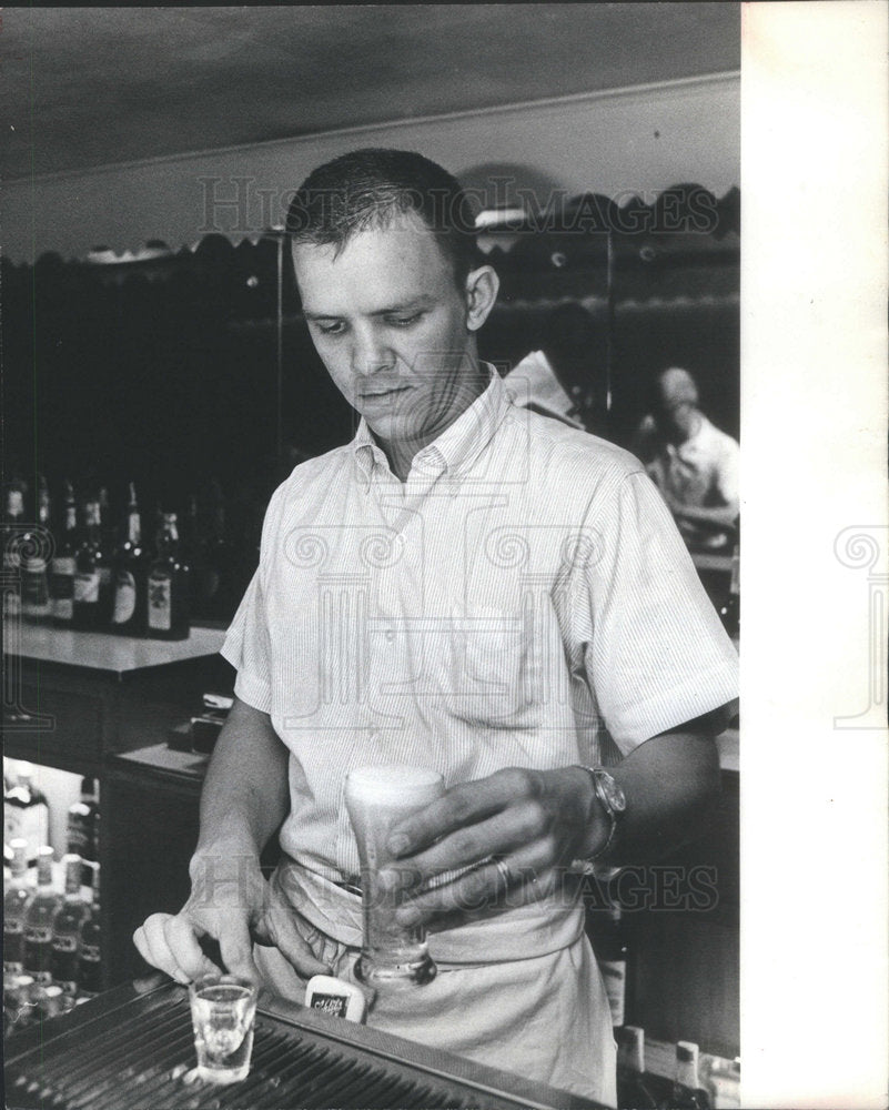 1966 Timmy Matulenas, President Johnson&#39;s son in law bar tending - Historic Images