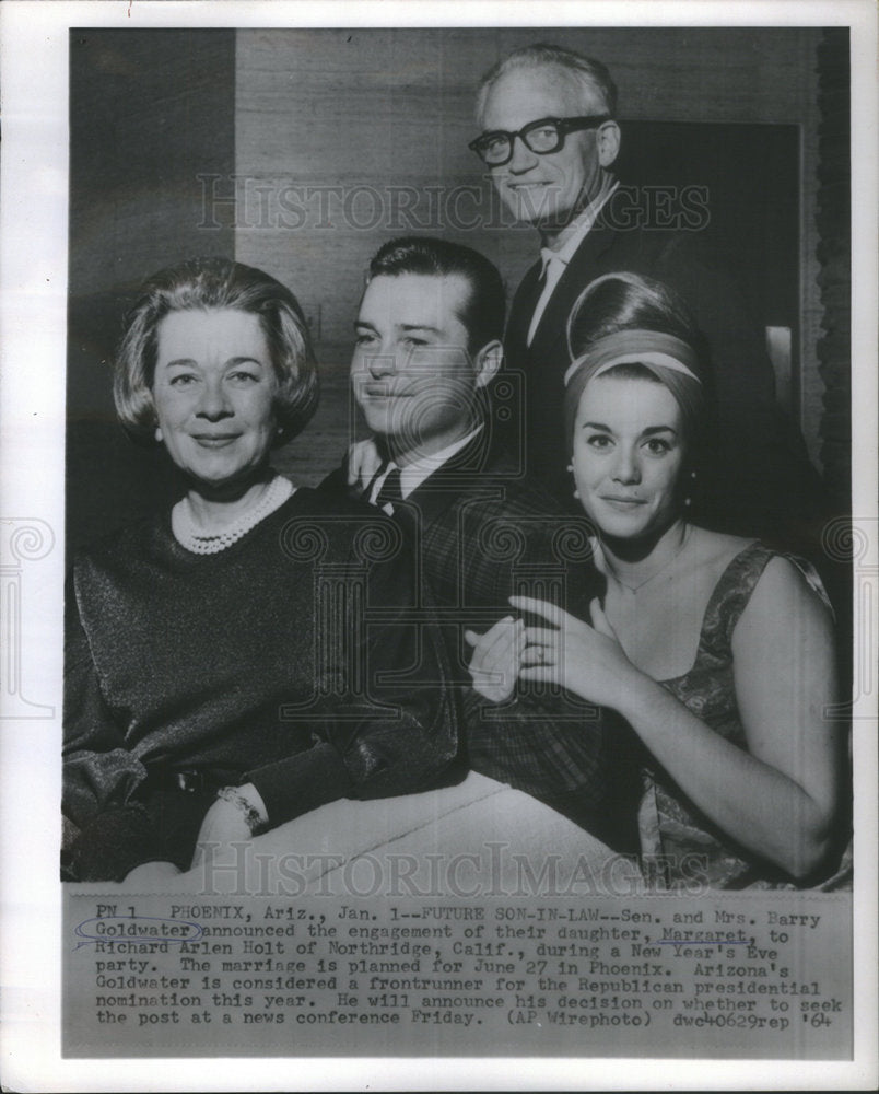 1964 Sen. and Mrs. Barry Goldwater at daughter&#39;s engagement - Historic Images