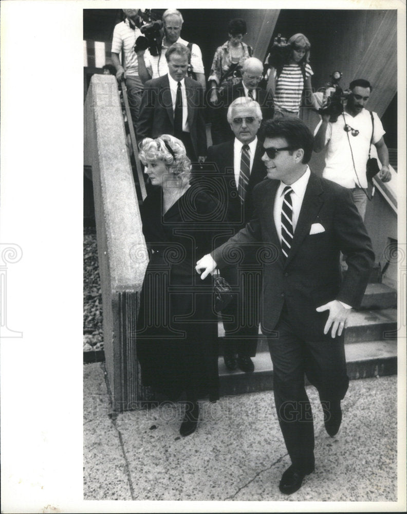 1967 Bob Wall and Wife Debra Harrison Leaving the Courthouse - Historic Images