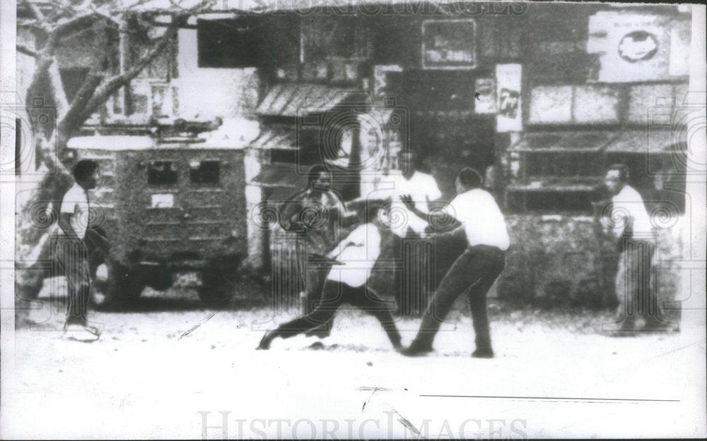 1961, Manila Phillipines Bus Company Watchman Attacked - RSC86733 - Historic Images