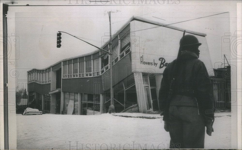 1964 Soldier Patrolling Downtown Earthquake Damaged Building - Historic Images