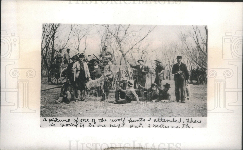 Diright wrotePicture Wolf hunts attended north leaning against tree holds rifle - Historic Images