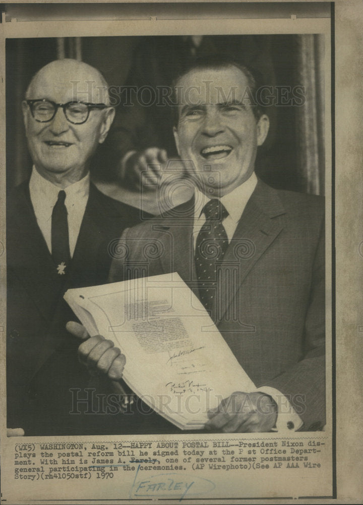 1970 James Farley with President Nixon displaying postal reform bill - Historic Images