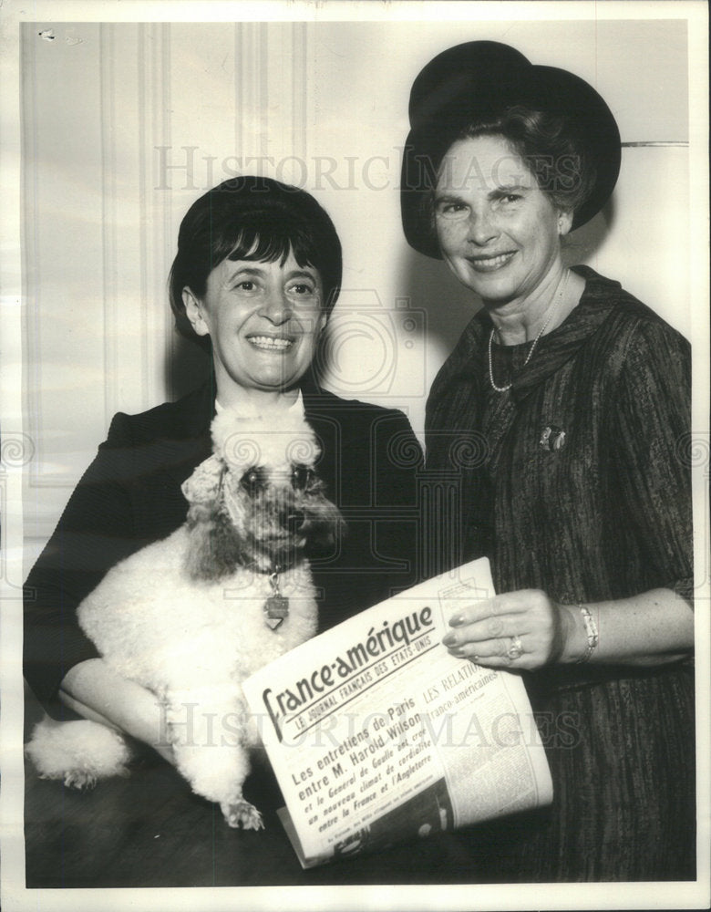 Press photo
Mrs Dorka Raynor holding poodle Lucie with Mrs Arthur Wirtz - Historic Images