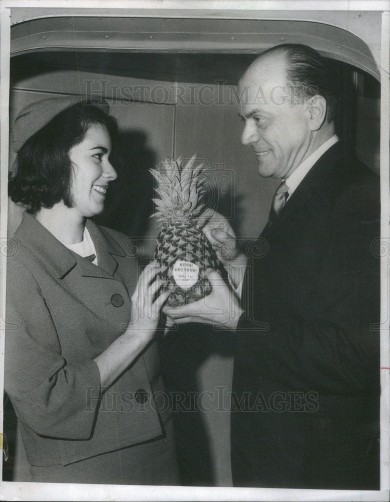 1966 Sol Polk Shows Marcia Goodman A Pineapple  - Historic Images
