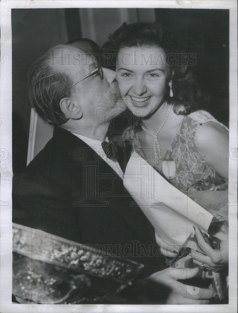 1953 Miss World 1953 Denise Perrier kissed by Theodore Valensi. - Historic Images