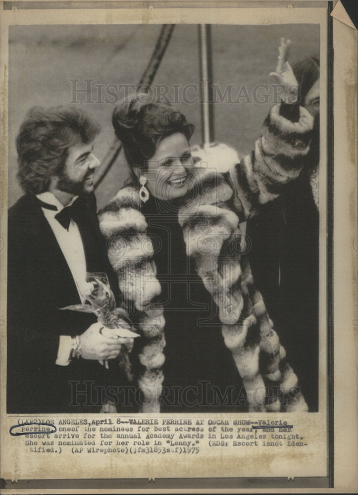 1975 Valerie Perrine and her escort at the Annual Academy Awards - Historic Images