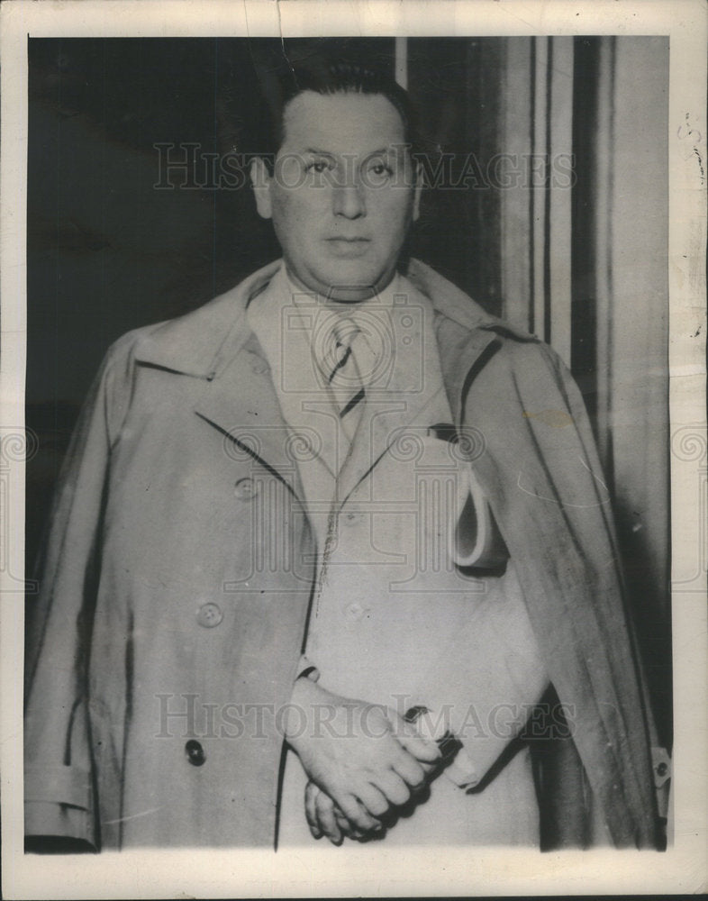 1946 Col. Juan Peron president of Argentina wearing his raincoat. - Historic Images