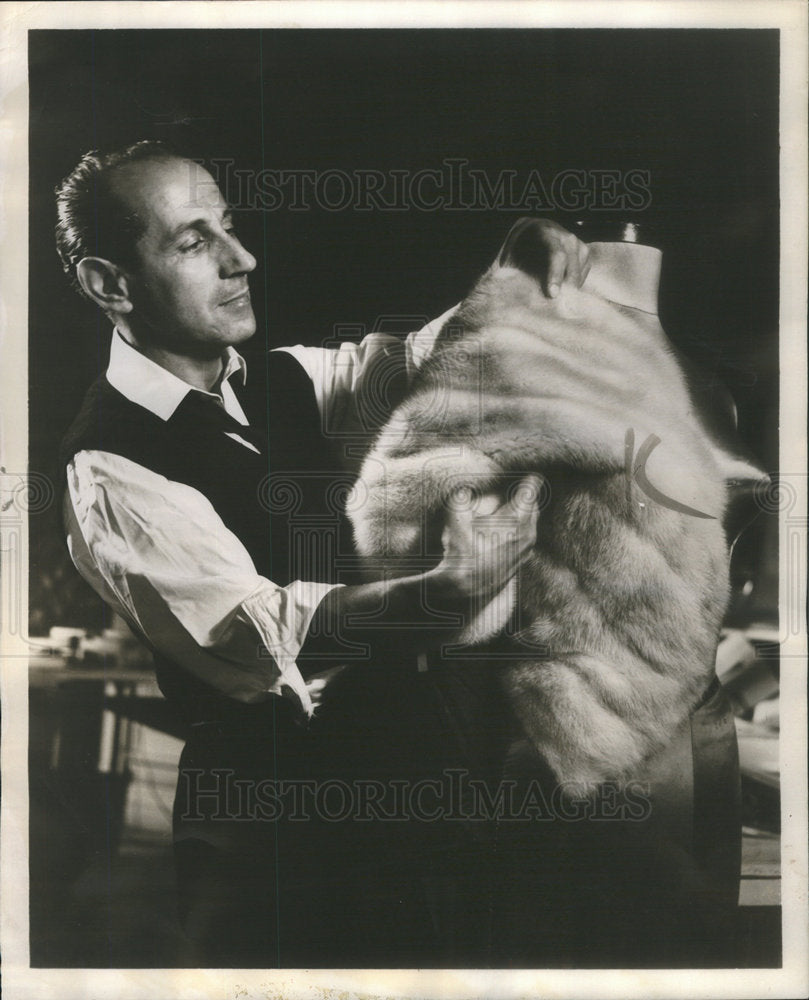 1957 Emeric Partos, award-winning fur designer. - Historic Images