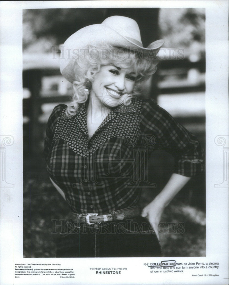 1987 Press Photo Dolly Parton as Singing Star Jake Ferris in "Rhinestone." - Historic Images