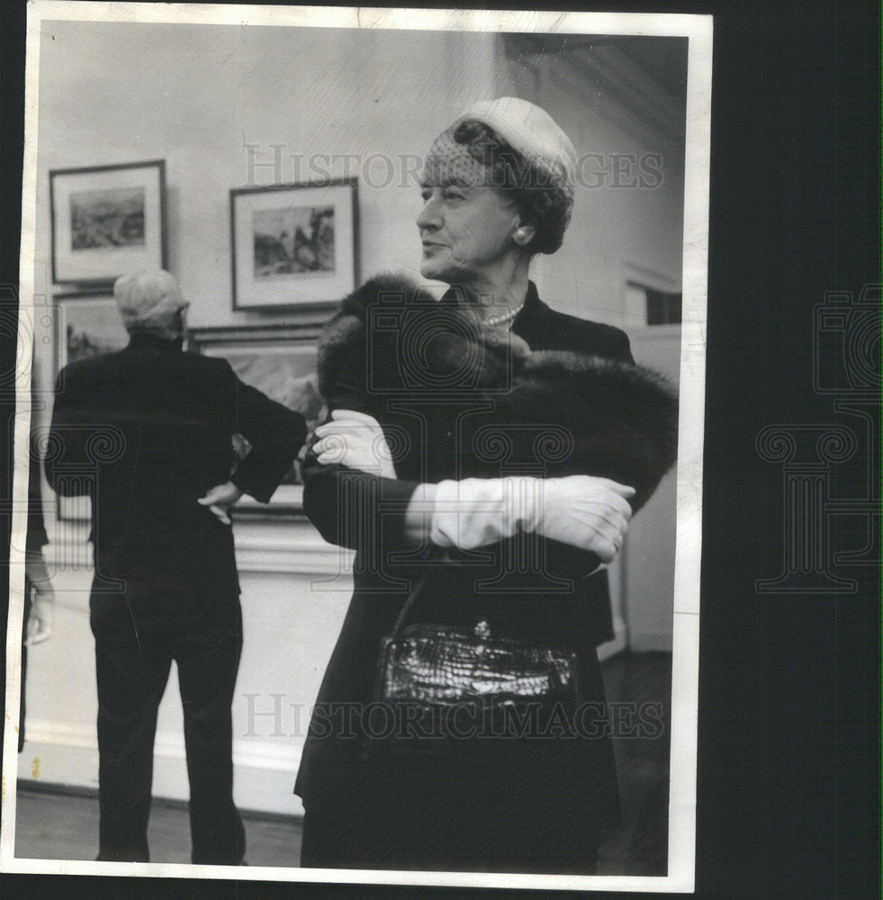 1964 Mrs Morton Stands Arms Cross In Exhibition Room With Currier - Historic Images