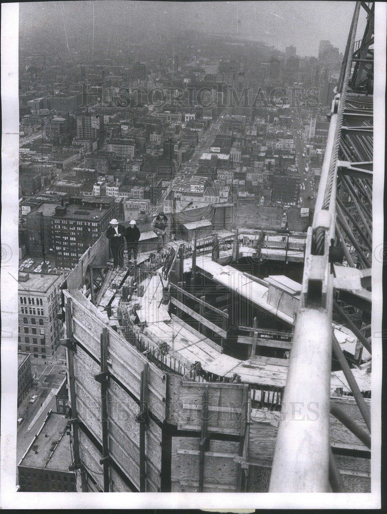 1961 Catering Service Girl Janie Pappas atop Marine Tower Core. - Historic Images