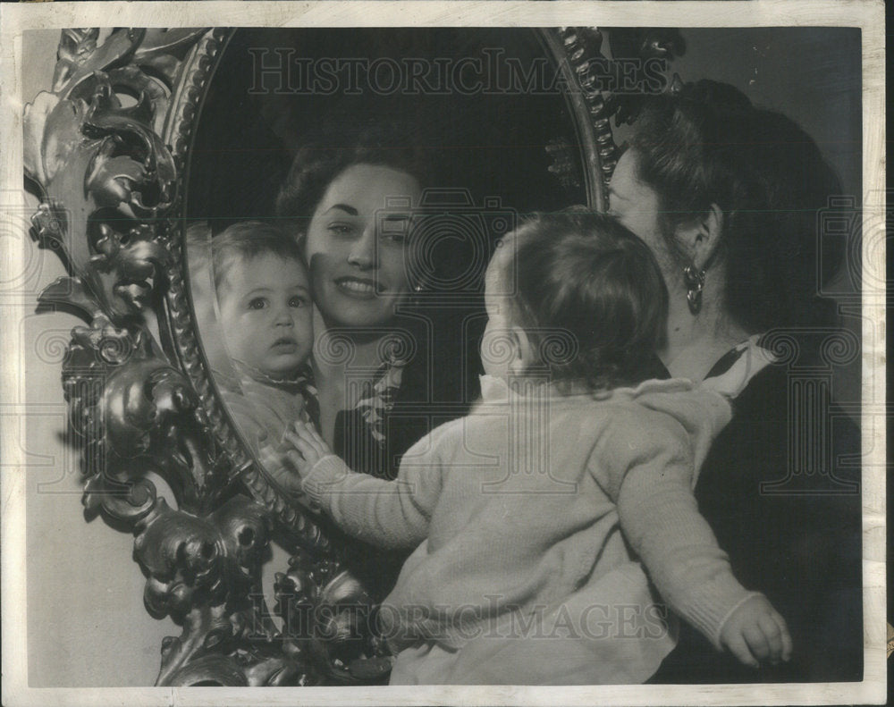 1942 Rawlins Found Something To LookAt When Mother Held Up To Mirror - Historic Images